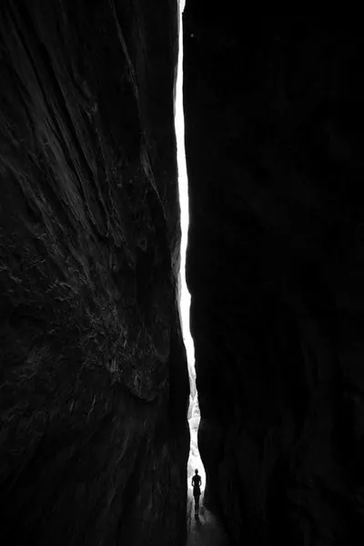 Monochrome Figure in Dark Void