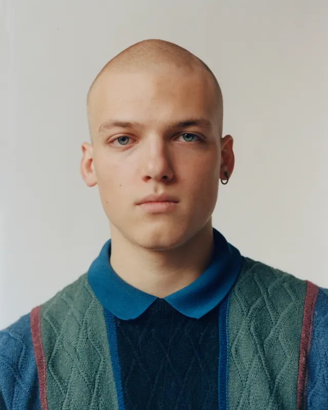 Patterned knit fashion portrait, editorial, photographic, muted