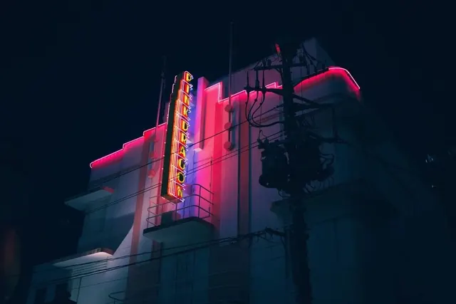 Pink Dragon neon Art Deco building, photographic, retro, dark