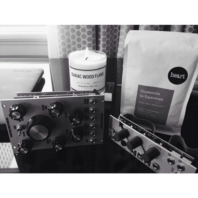 Music production equipment and product flat lay, photographic, minimal, monochrome