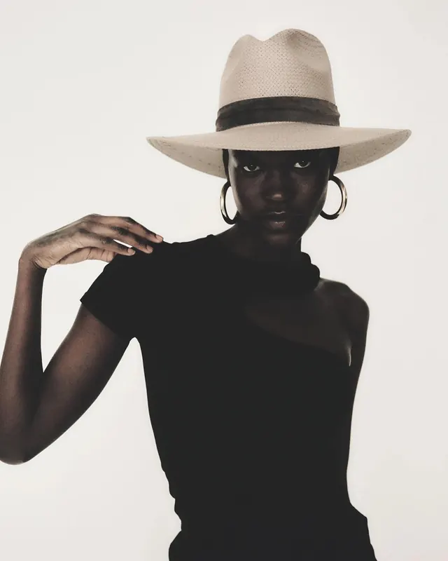 Portrait of a Woman in a Straw Hat