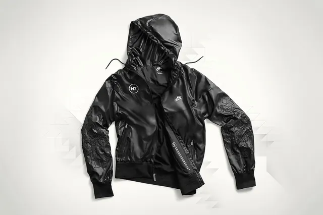 Nike N7 windbreaker flat lay, photographic, minimal, dark