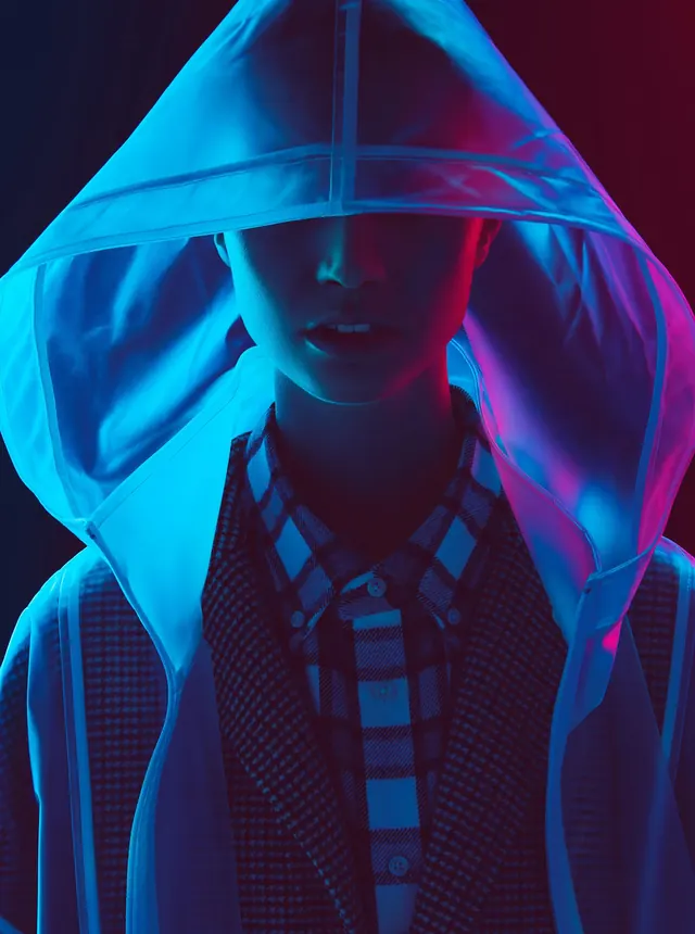 Neon-lit translucent hood portrait, dark-mode, photographic, dark