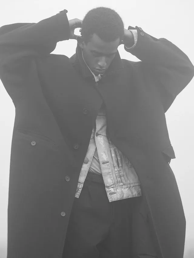 Layered coats fog portrait, photographic, editorial, monochrome