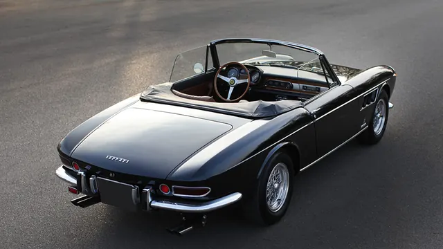 Ferrari 275 GTS overhead rear view, photographic, luxury, dark