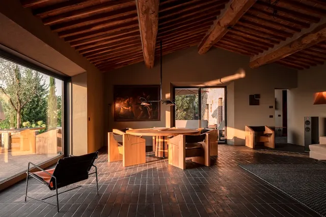 Rustic modern dining room at golden hour, photographic, organic, warm