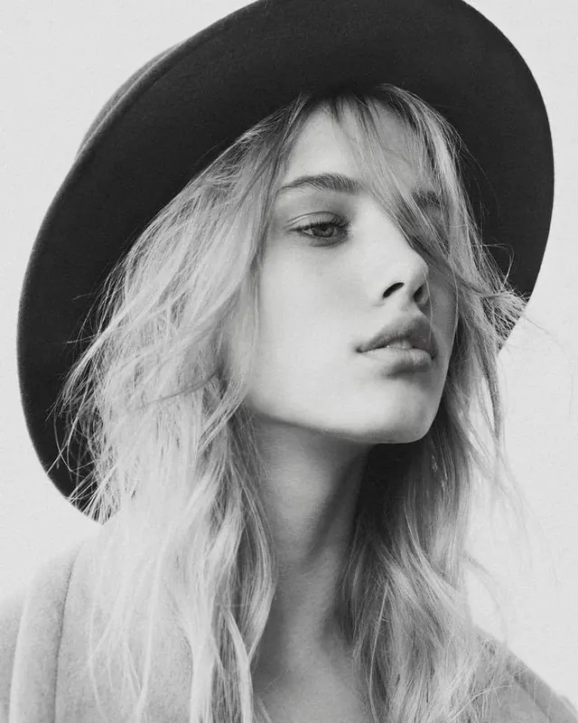 Wide-brim hat black-and-white portrait, photographic, minimal, monochrome