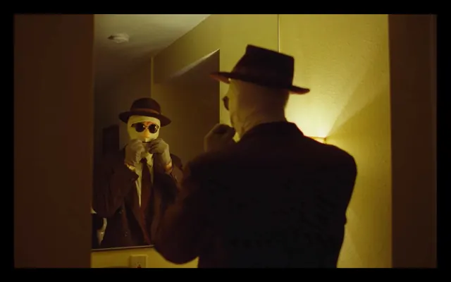 Bandaged man mirror in yellow light, editorial, photographic, warm