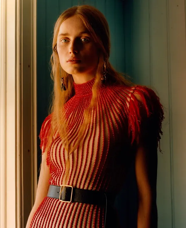 Red beaded fashion portrait, editorial, photographic, warm