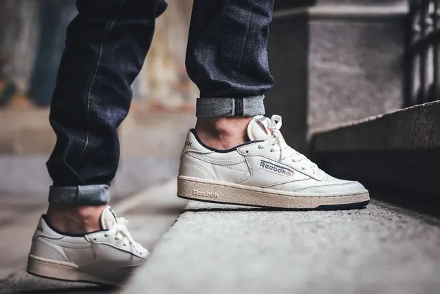 Sneaker Mockup on Concrete, photographic, minimal, muted