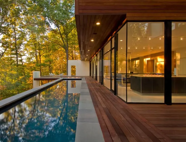 Modern Wood and Glass Architecture with Infinity Pool, luxury, photographic, warm