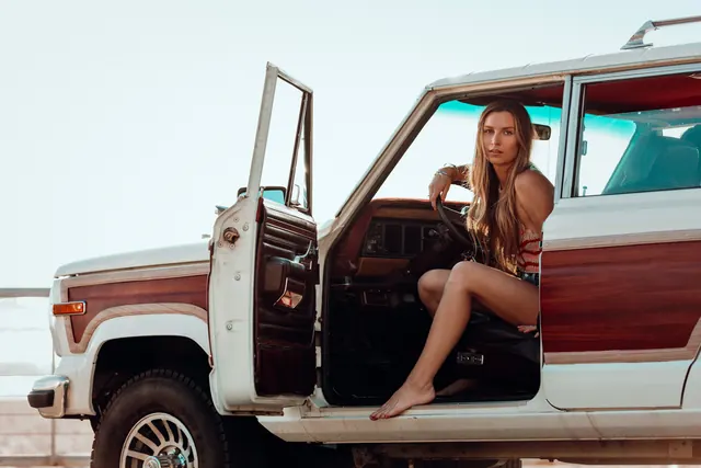 Woman in Vintage SUV, photographic, retro, warm