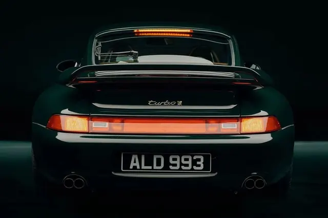 Rear View of a Modern Car at Night, dark-mode, photographic, dark