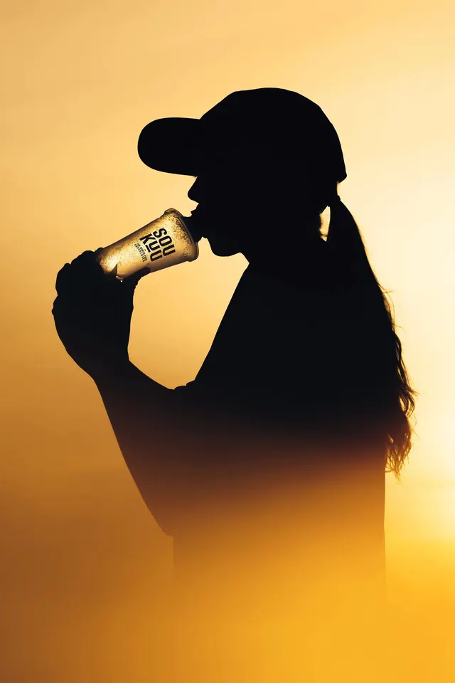 Soukuu cup silhouette golden haze, photographic, minimal, warm
