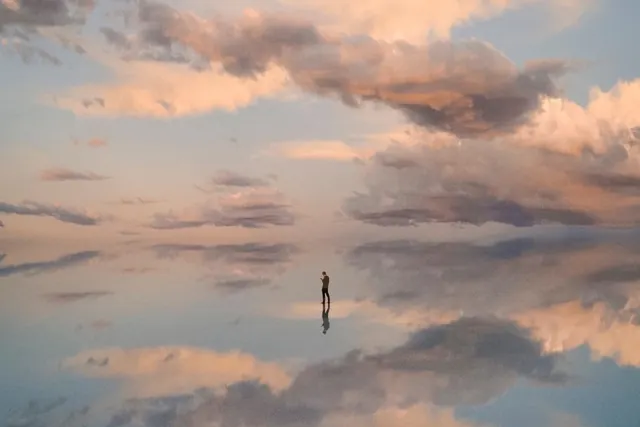 Salt flat cloud reflection portrait, photographic, minimal, pastel