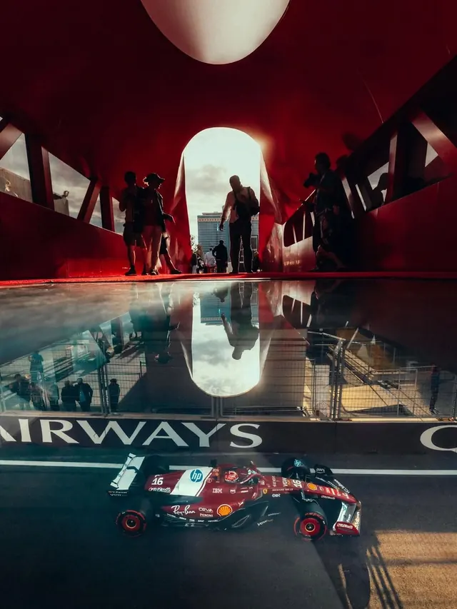 Ferrari F1 Car in Reflective Red Interior, photographic, editorial, dark