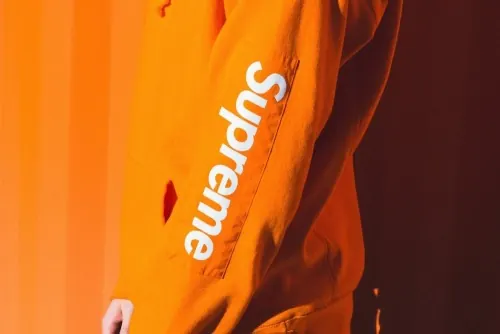 Supreme Logo on Orange Fabric, photographic, minimal, vibrant