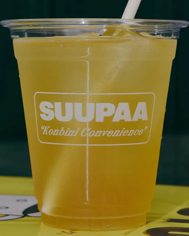 Suupaa konbini drink cup branding, minimal, photographic, vibrant