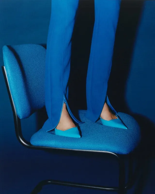Blue monochrome fashion chair study, photographic, editorial, cool