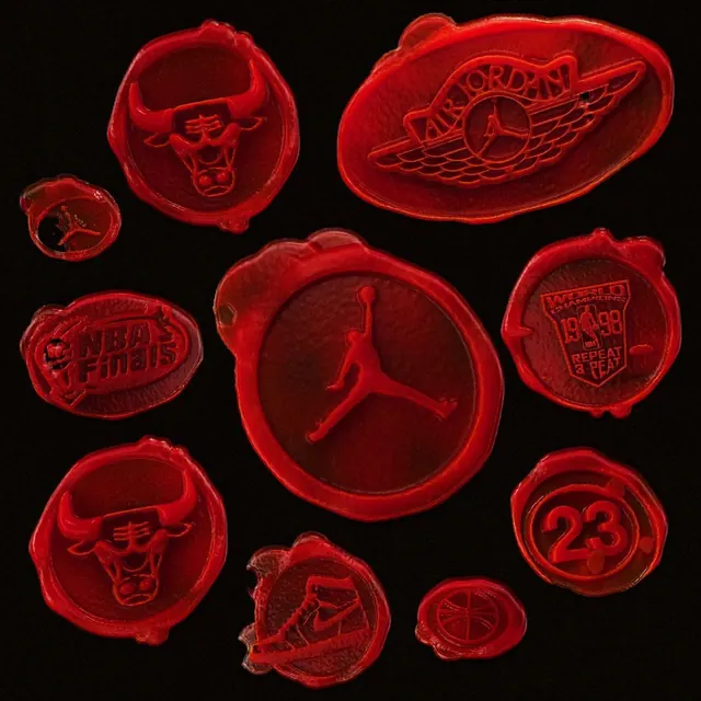 Jordan wax seal flat lay, photographic, minimal, dark