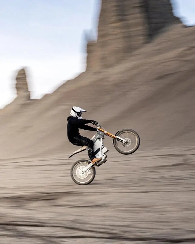 Cake electric bike action photo, photographic, minimal, muted