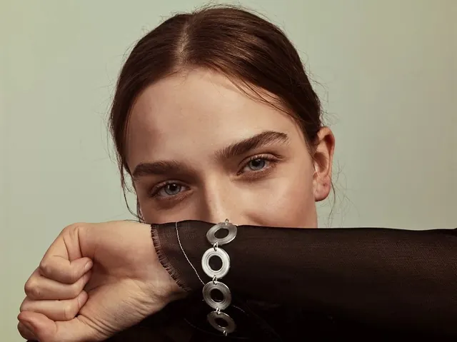 Silver ring bracelet fashion portrait, editorial, photographic, muted