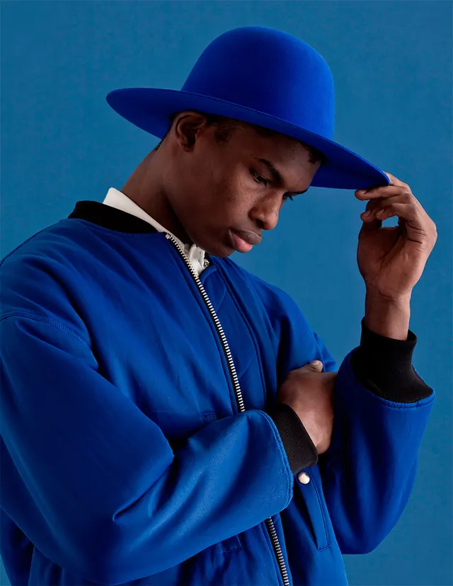 Monochrome blue fashion portrait, editorial, photographic, vibrant