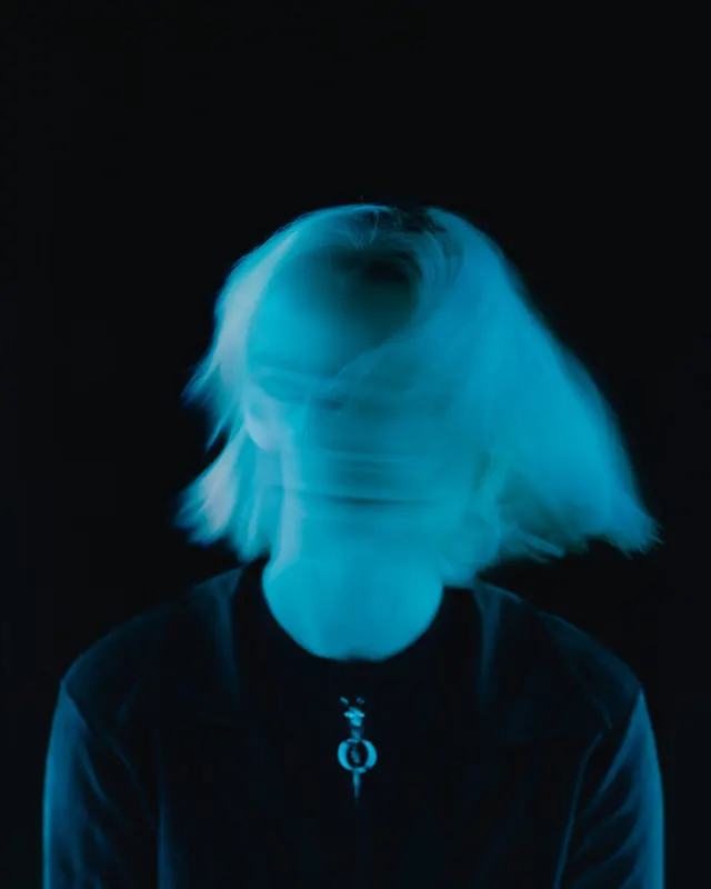 Cyan motion-blur portrait, photographic, abstract, dark