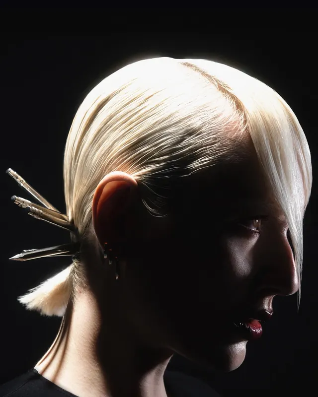 Low-key profile with pencil hairpins, editorial, photographic, dark