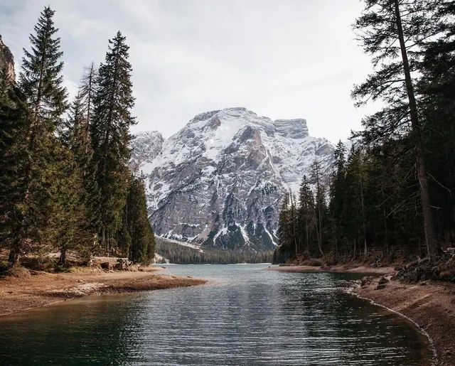 Alpine lake mountain landscape, photographic, minimal, muted