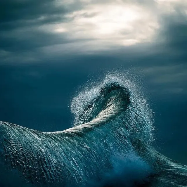 Backlit ocean wave peak, photographic, minimal, dark