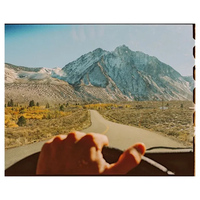 Film-border road trip POV, photographic, retro, warm