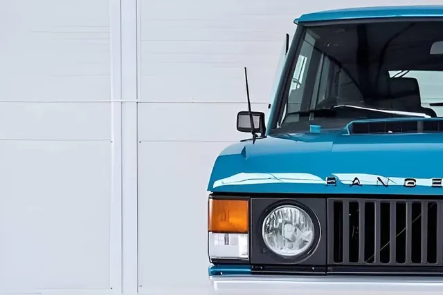 Teal vintage Range Rover corner, minimal, photographic, cool