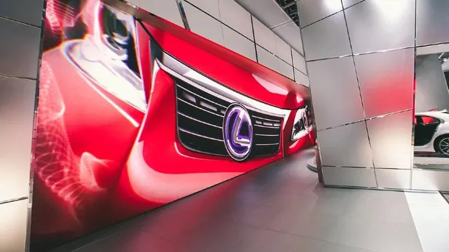 Red Car Front Grille Close-up, photographic, luxury, vibrant