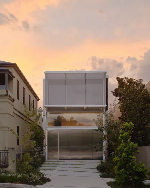 Mesh-screen infill townhouse, minimal, technical, warm