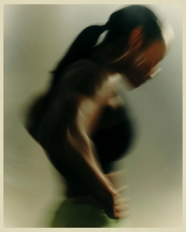 Motion-blur activewear portrait, photographic, editorial, muted
