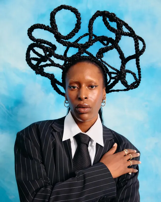 Sculptural braided hair portrait, editorial, photographic, cool