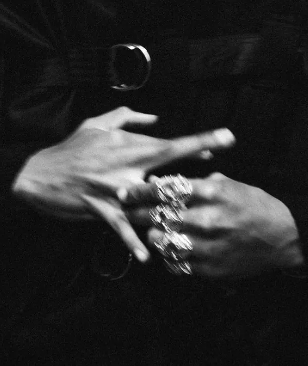 Chunky rings motion-blur hands, photographic, monochrome, monochrome