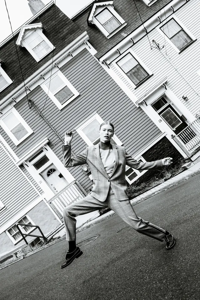 Plaid suit on tilted street, editorial, photographic, monochrome