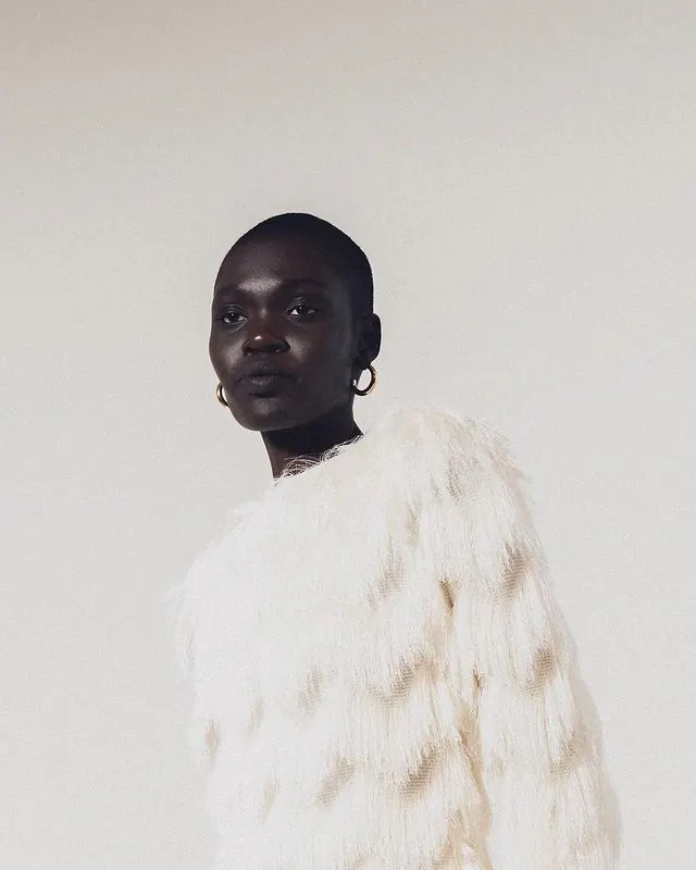 Fringed white top fashion portrait, minimal, photographic, light