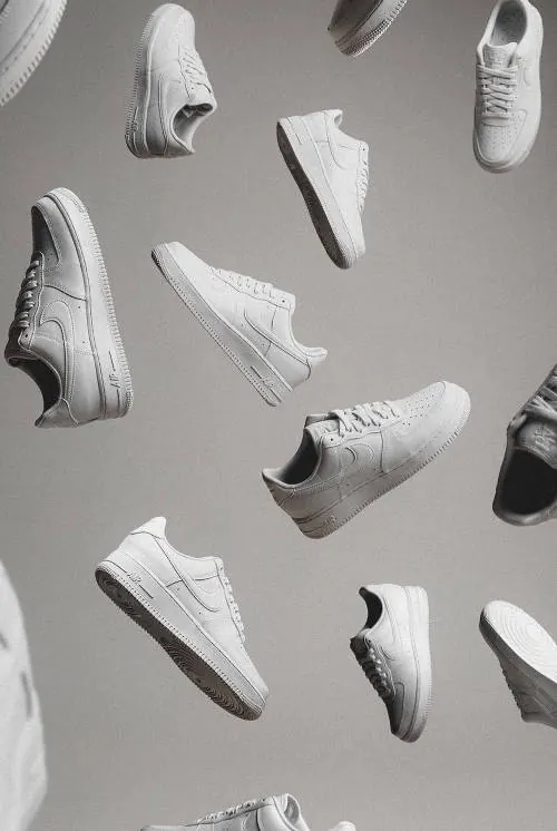 Floating white Nike Air Force 1s, minimal, photographic, monochrome