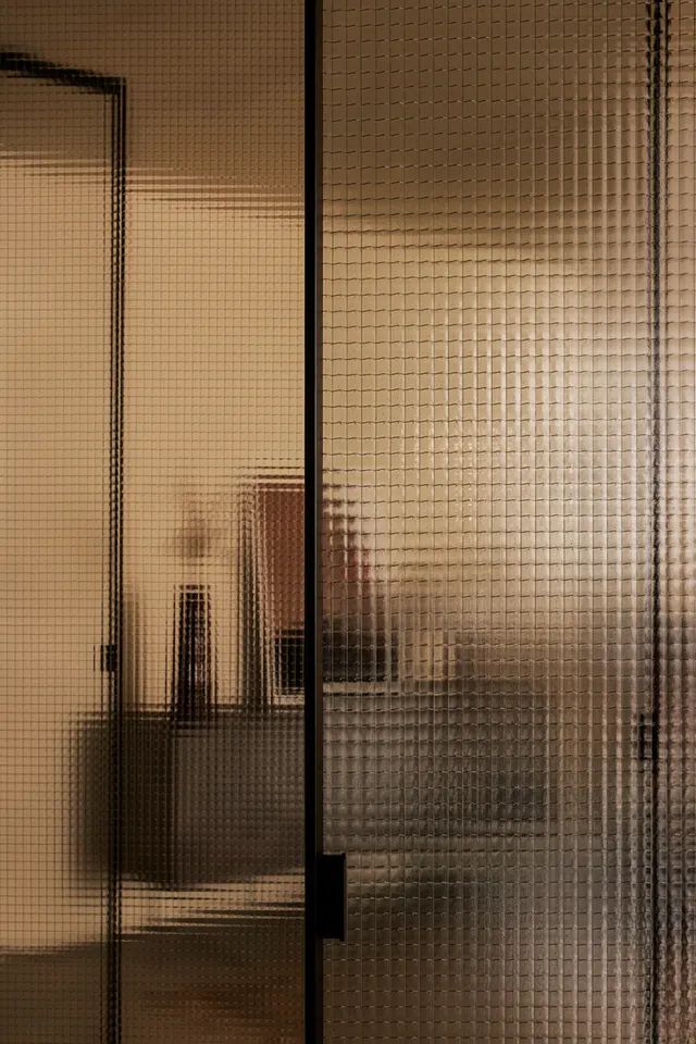 Amber reeded glass interior panel, minimal, organic, warm