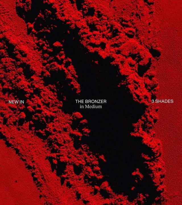 Red bronzer powder macro, minimal, editorial, dark