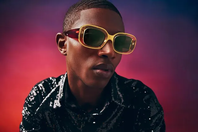 Sequin jacket yellow shield sunglasses portrait, editorial, luxury, vibrant
