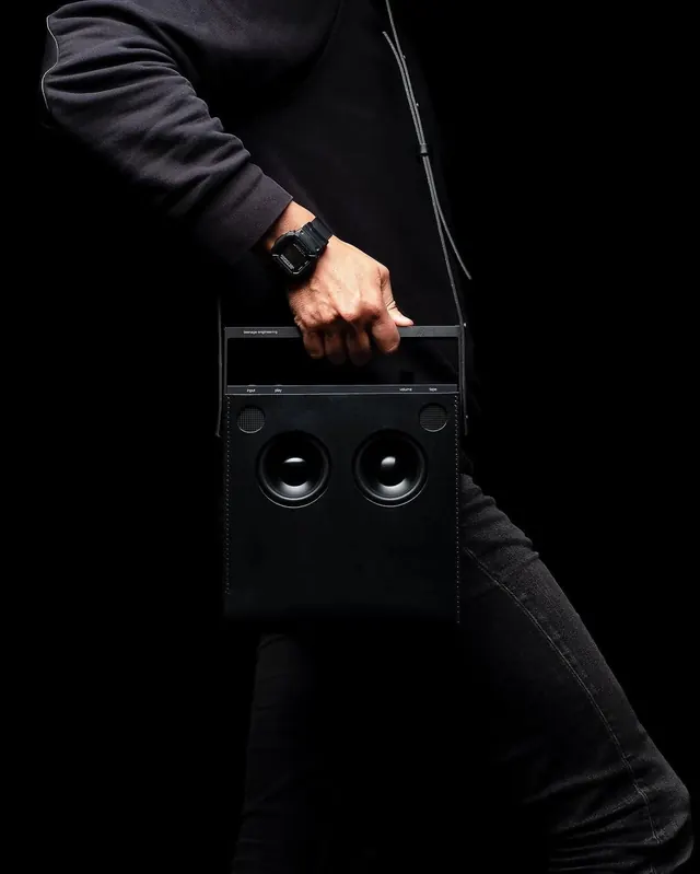 Person Holding Studio Monitor