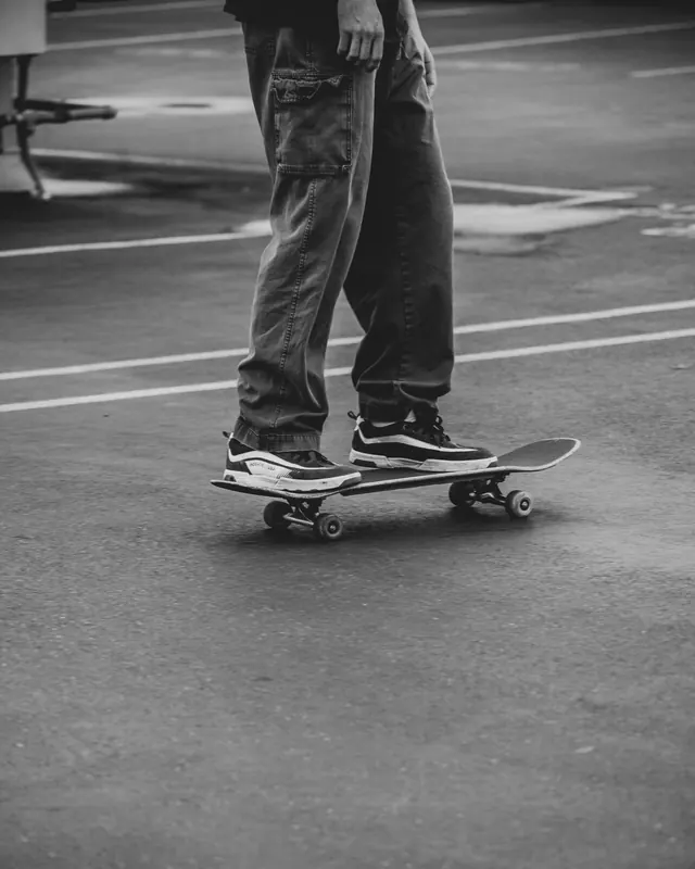 Skateboarding lifestyle black and white photo, photographic, minimal, monochrome
