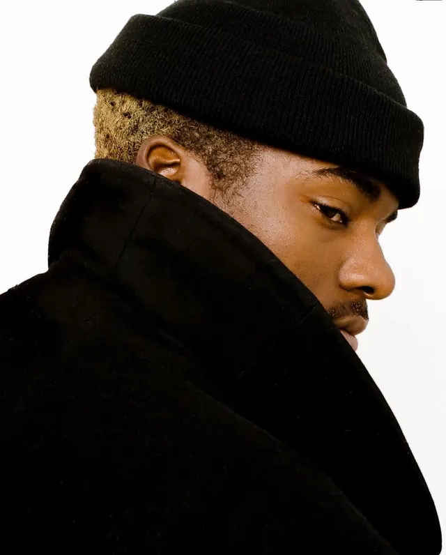 Portrait of a man in a black beanie