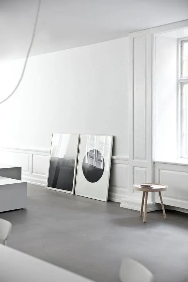 Minimalist interior with framed artworks, minimal, photographic, light
