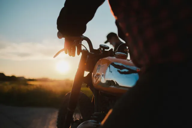 Motorcycle Rider at Sunset