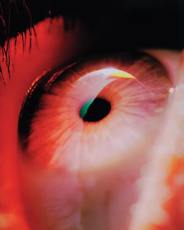 Macro eye with warm-toned iris, photographic, abstract, warm